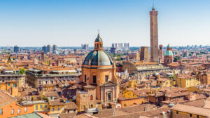 Aerial panoramic cityscape of Bologna, Italy, above rooftops of typical houses, ancient buildings and medieval towers