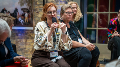 Tetiana Preobrazhenska, Marketing Specialist for URAN, talking during the Community Hub